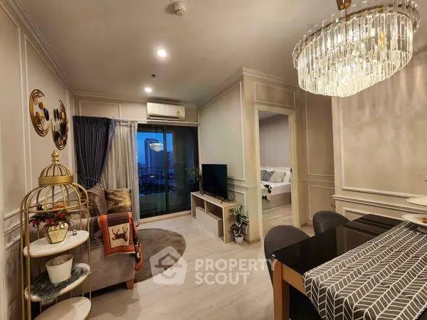 Elegant living room with modern decor and city view from balcony