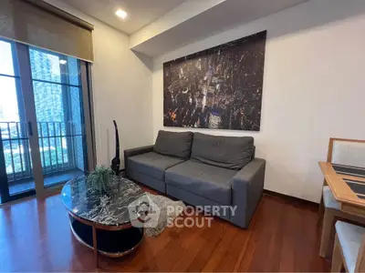 Modern living room with city view, stylish sofa, and elegant decor