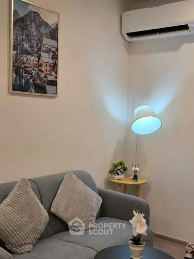 Cozy living room with modern decor and air conditioning