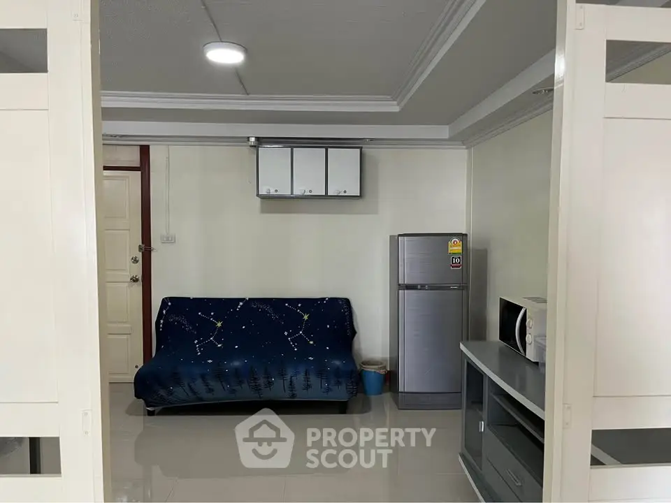 Cozy living room with modern appliances and stylish decor