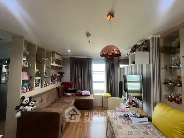 Cozy living room with modern decor and ample natural light