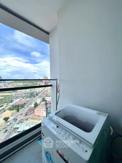 Modern balcony with washing machine and stunning city view