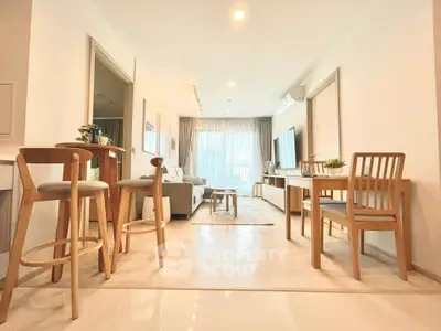 Spacious modern living room with elegant decor and natural light
