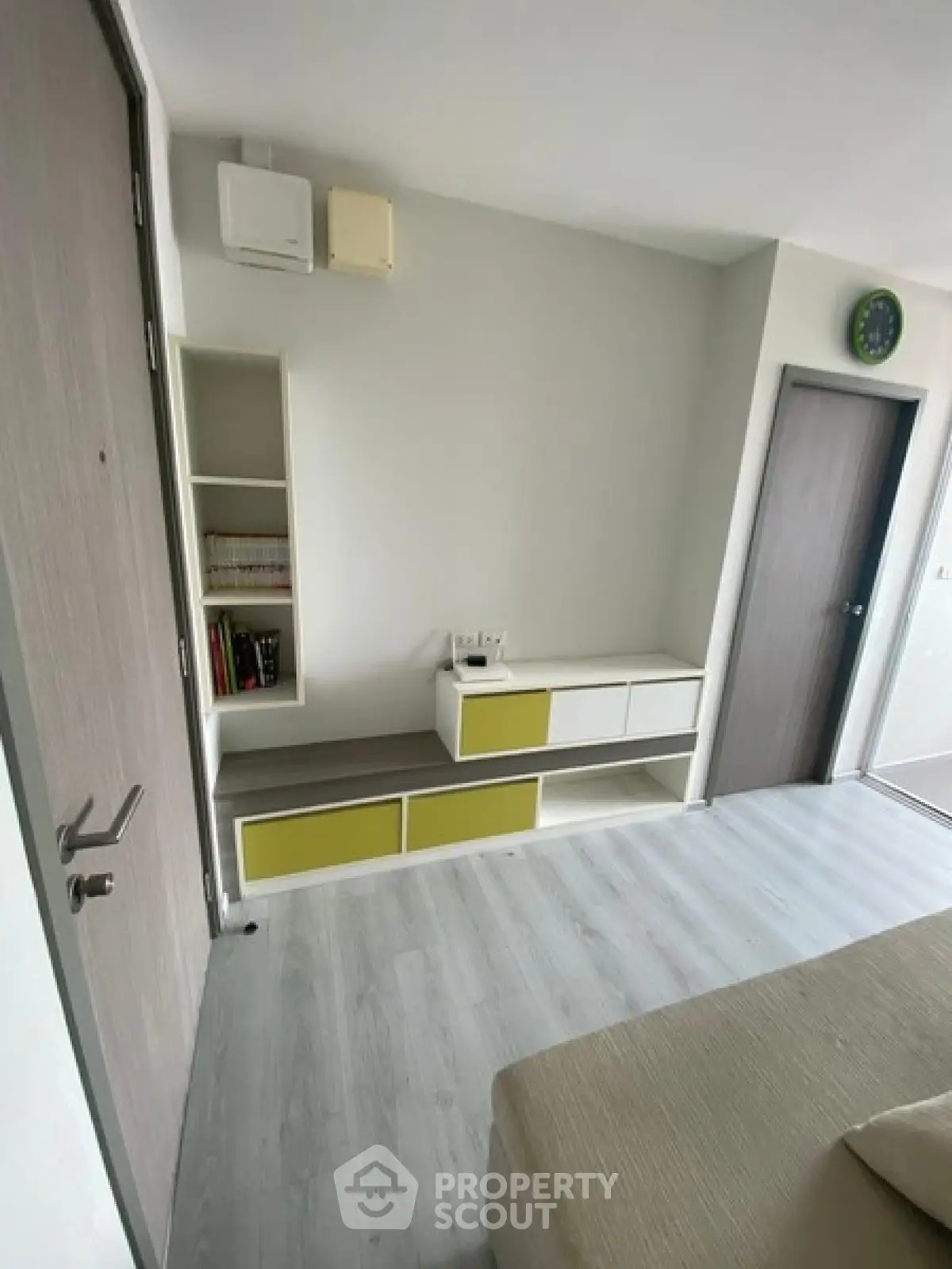 Modern living room with sleek storage and minimalist design