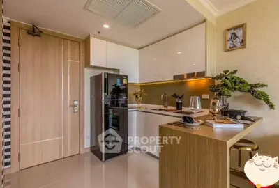 Modern kitchen with sleek cabinetry and built-in appliances in a stylish apartment.