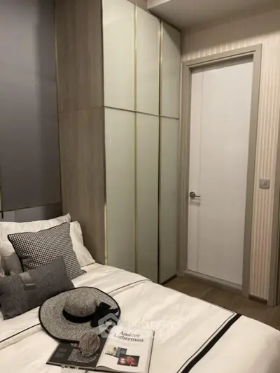 Stylish bedroom with modern decor and elegant wardrobe