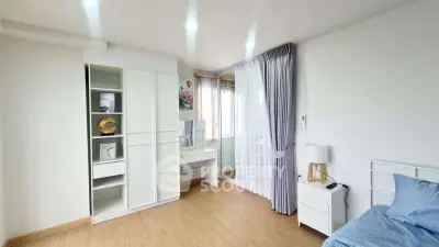 Bright and airy bedroom with modern decor and ample natural light