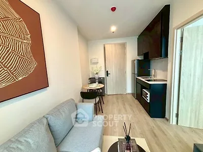Modern living room with sleek kitchen in open layout apartment