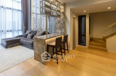 Luxurious modern living room with elegant bar area and stylish decor