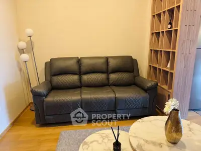 Cozy living room with elegant leather sofa and modern decor