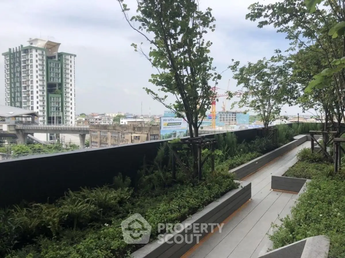 Stunning rooftop garden with lush greenery and city views, perfect for relaxation and urban living.