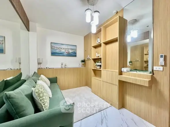 Modern living room with green sofa and stylish wooden shelving
