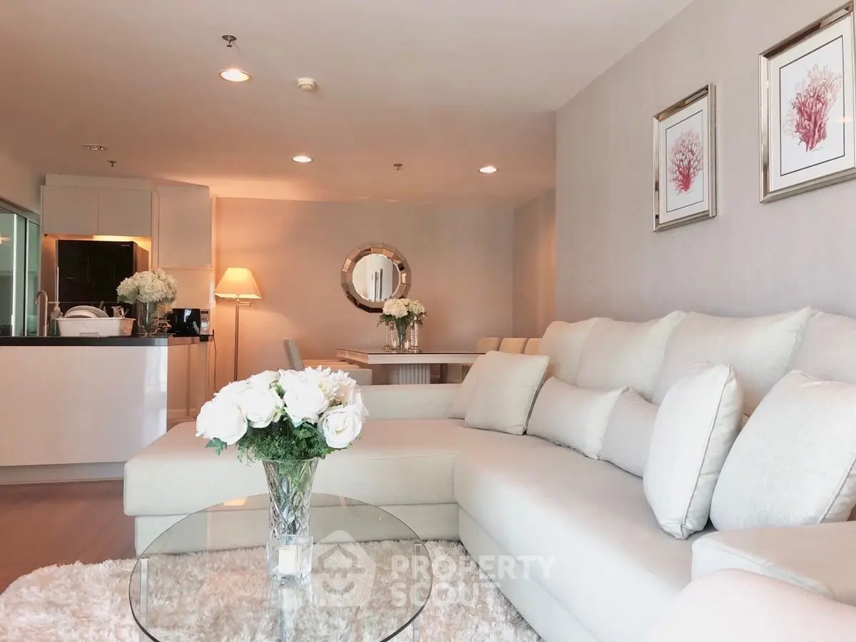 Elegant living room with plush sofa and stylish decor in modern apartment