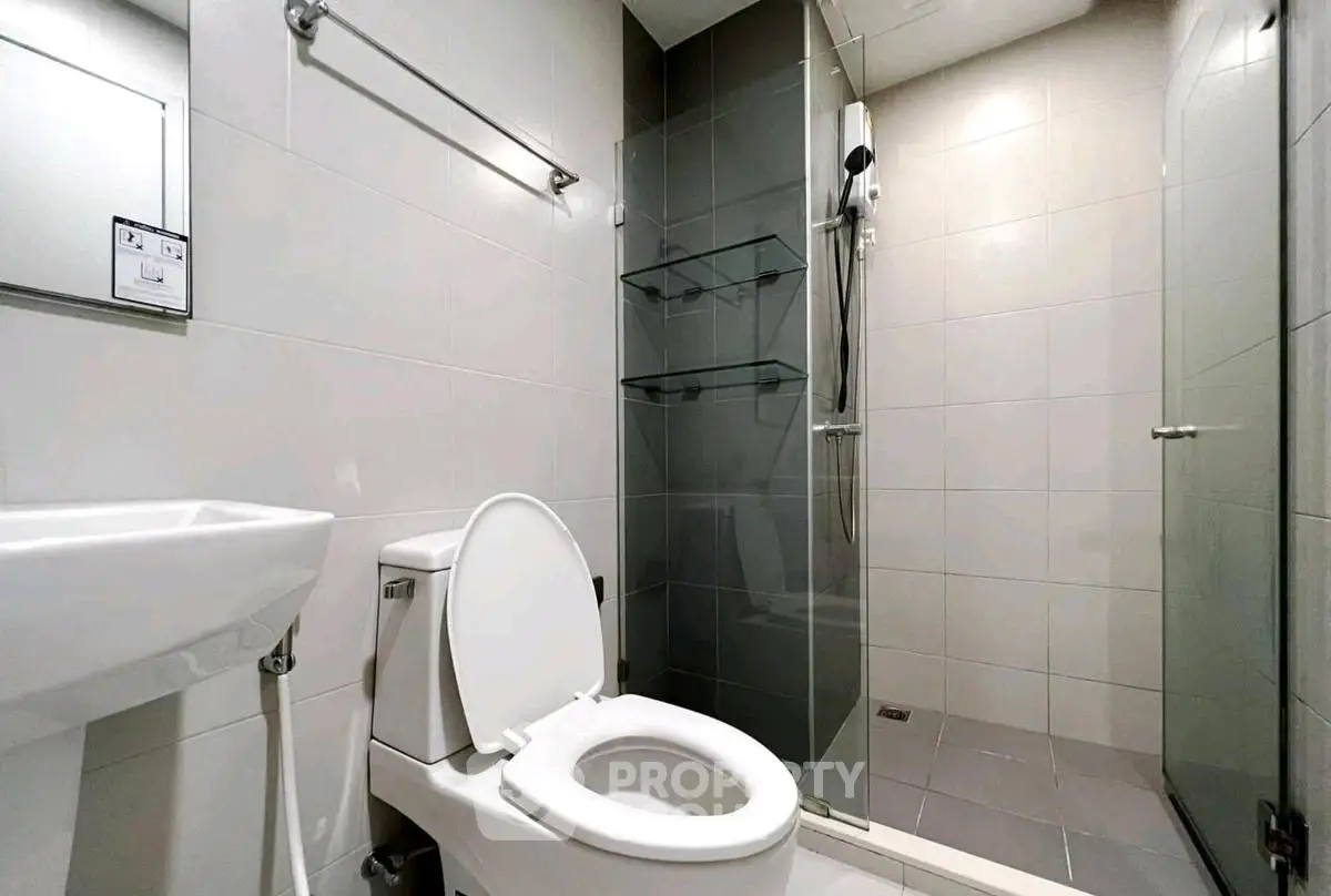 Modern bathroom with sleek shower and minimalist design