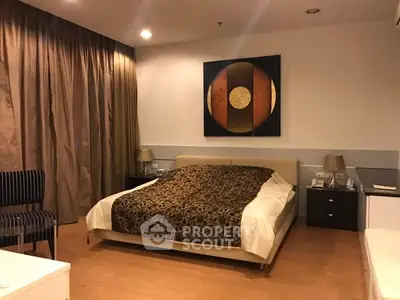 Luxurious bedroom with elegant decor and ambient lighting for a cozy retreat.