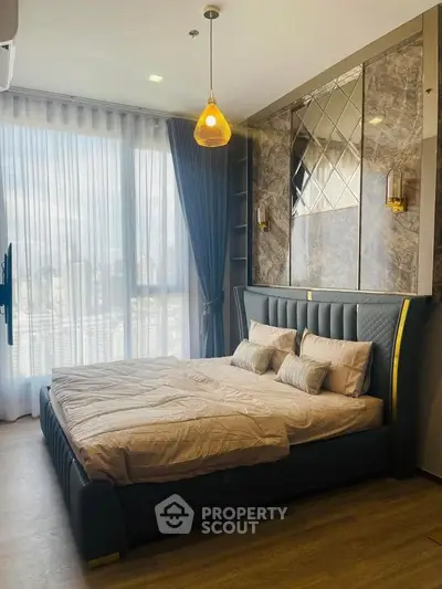 Luxurious bedroom with elegant decor and large window view