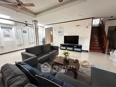 Spacious living room with modern furniture and elegant decor