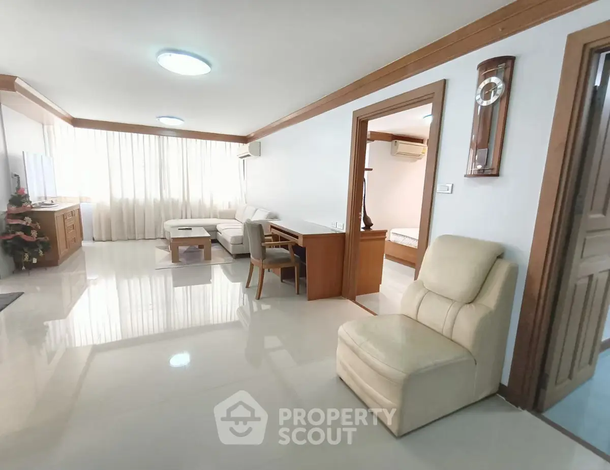 Spacious living room with modern furniture and natural light