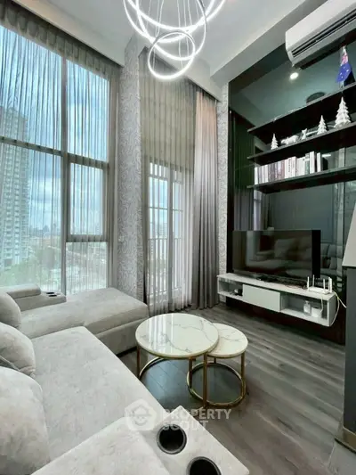 Luxurious modern living room with high ceilings and large windows offering city views.
