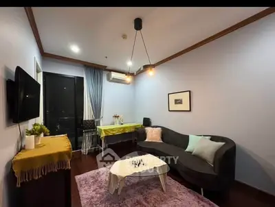 Cozy modern living room with stylish decor and ambient lighting