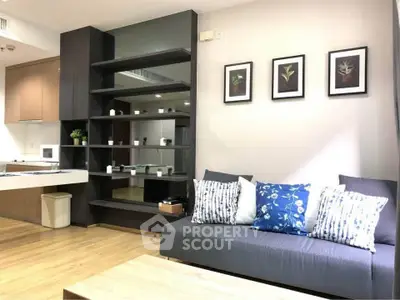 Modern living room with stylish decor and open kitchen layout