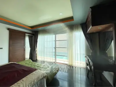 Luxurious bedroom with floor-to-ceiling windows and elegant decor