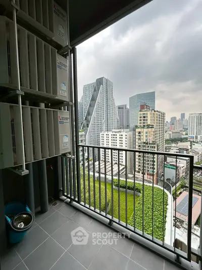 Stunning urban balcony view with modern cityscape and lush green rooftop garden.