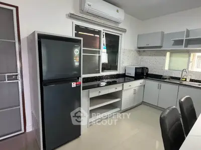 Modern kitchen with sleek appliances and open layout design