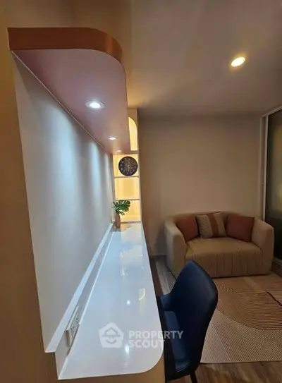 Modern living room with stylish furniture and ambient lighting