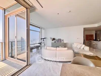 Luxurious high-rise living room with panoramic city views and modern decor