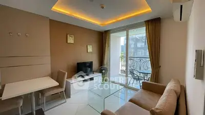 Modern living room with elegant decor and balcony access in a stylish apartment.