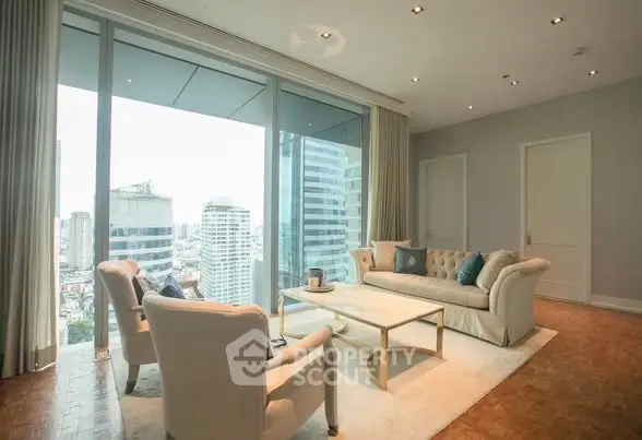 Luxurious living room with panoramic city view and elegant furnishings