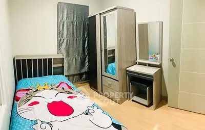 Cozy bedroom with modern furniture and playful bedding