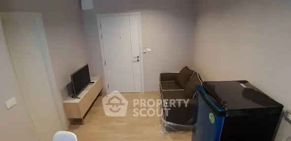 Cozy living room with modern furniture and compact layout