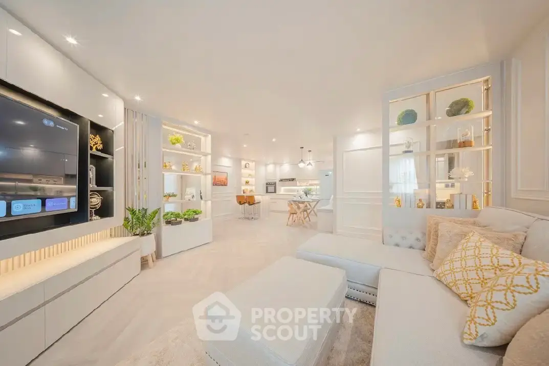 Luxurious open-plan living room with elegant decor and modern furnishings