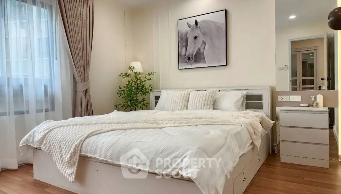 Cozy bedroom with elegant decor and natural light