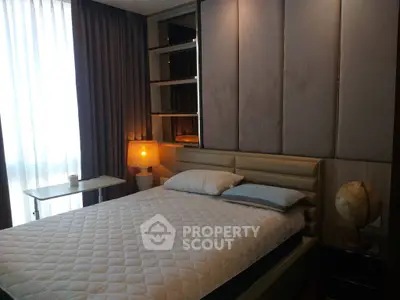 Modern bedroom with elegant decor and ambient lighting