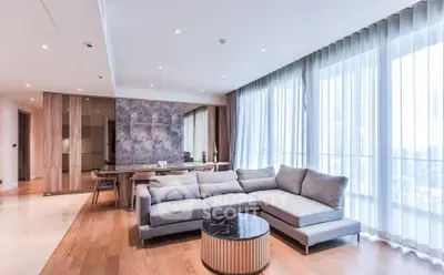 Luxurious modern living room with large windows and elegant decor