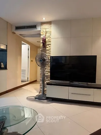 Modern living room with sleek TV unit and stylish decor