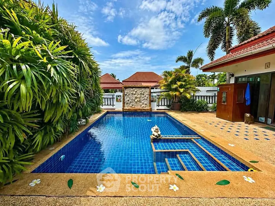 Stunning tropical villa with private pool and lush garden, perfect for luxurious relaxation.