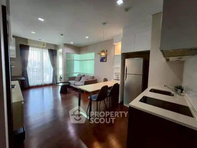 Spacious modern living room with open kitchen and stylish decor