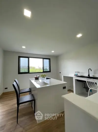 Modern kitchen with open layout and sleek design