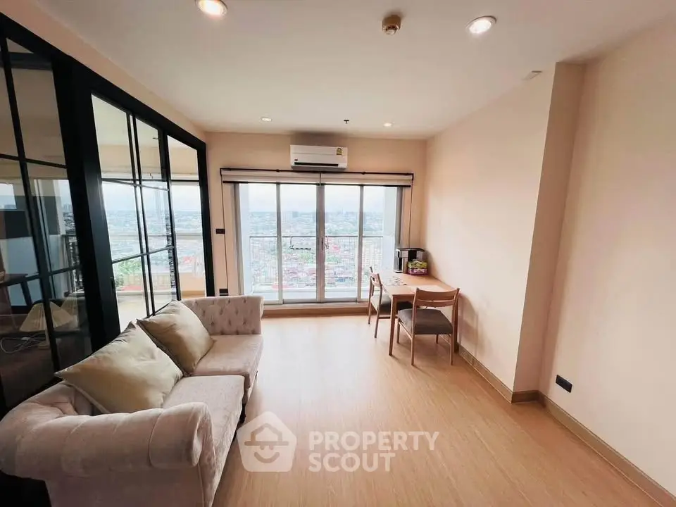 Spacious living room with panoramic city view and elegant furnishings