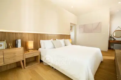 Elegant bedroom with modern wooden furniture and soft lighting