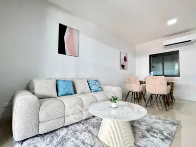 Modern living room with stylish decor and cozy seating area