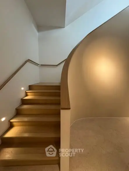 Elegant staircase with modern lighting in a contemporary home interior