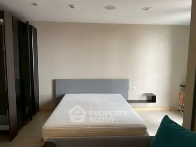 Spacious bedroom with minimalist design and modern furnishings