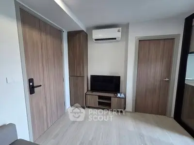Modern living room with wooden accents and air conditioning unit