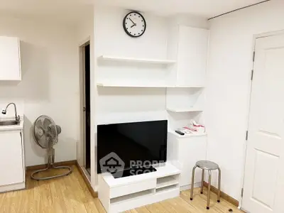 Modern living room with sleek TV setup and minimalist decor