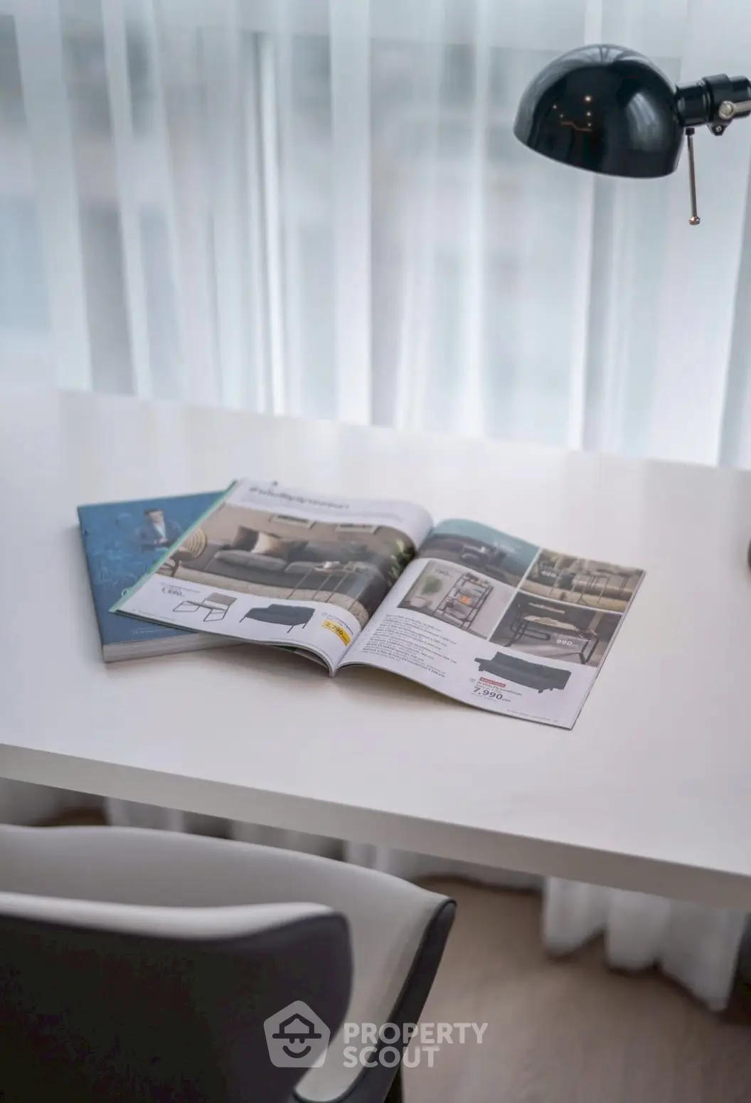 Modern study area with sleek desk, chair, and lamp, perfect for productivity and style.